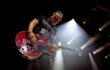 Peter Hook plays guitar